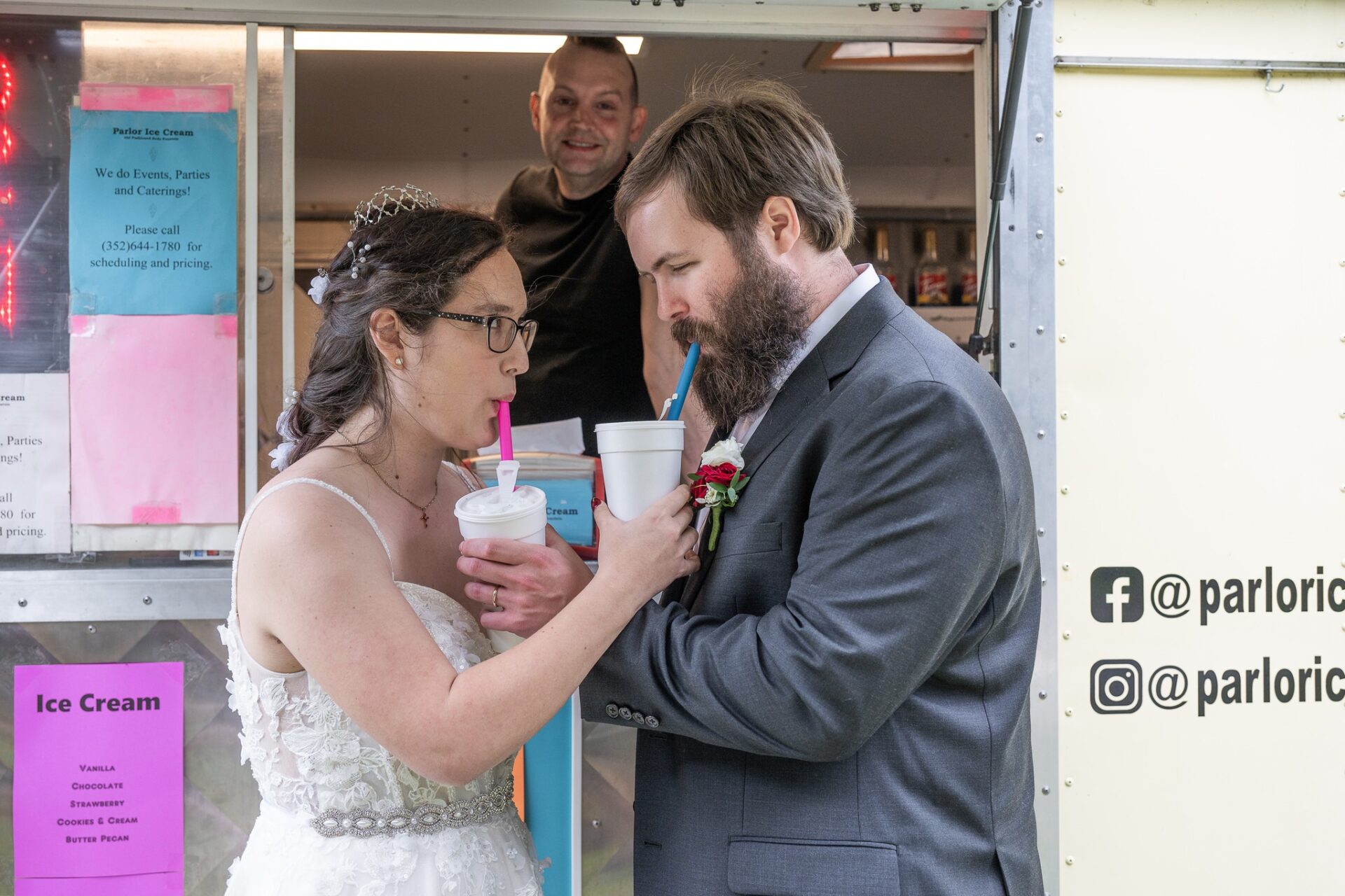 Couple Shares a milkshake at their wedding